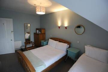 Фото номера Трехместный номер с видом на море Гостевой дом Rolling Wave Guesthouse г. Бандоран 20