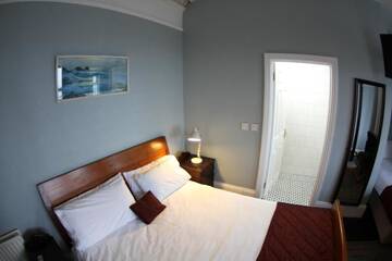 Фото номера Трехместный номер с видом на море Гостевой дом Rolling Wave Guesthouse г. Бандоран 32