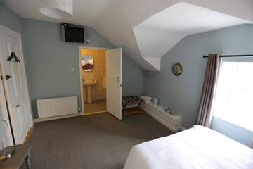 Фото номера Трехместный номер Гостевой дом Rolling Wave Guesthouse г. Бандоран 3