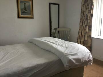 Фото номера Трехместный номер с видом на море Лоджи The Boathouse Lodge Hostel г. Бандоран 19