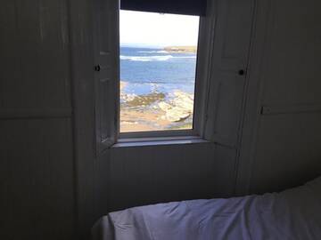 Фото номера Трехместный номер с видом на море Лоджи The Boathouse Lodge Hostel г. Бандоран 17