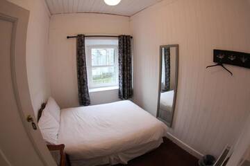 Фото номера Двухместный номер с 1 кроватью Лоджи The Boathouse Lodge Hostel г. Бандоран 2