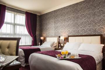 Фото номера Двухместный номер с 2 отдельными кроватями Отель The Great Northern Hotel г. Бандоран 3