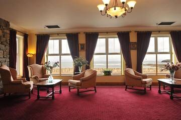 Фото номера Двухместный номер с 1 кроватью с видом на море Отель Fitzgeralds Hotel г. Бандоран 18