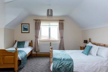 Фото номера Отдельный дом с 4 спальнями Дома для отпуска Portbeg Holiday Homes at Donegal Bay г. Бандоран 8