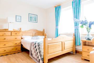Фото номера Four-Bedroom Basic Semi Detached House Дома для отпуска Portbeg Holiday Homes at Donegal Bay г. Бандоран 6