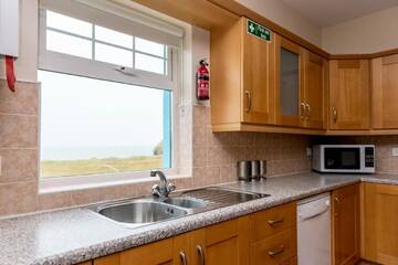 Фото номера Отдельный дом с 4 спальнями Дома для отпуска Portbeg Holiday Homes at Donegal Bay г. Бандоран 19