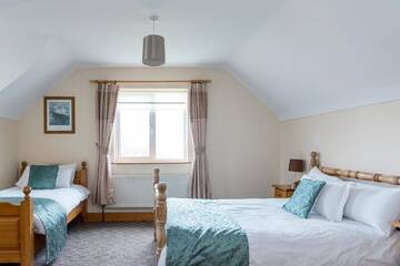 Фото номера Отдельный дом с 4 спальнями Дома для отпуска Portbeg Holiday Homes at Donegal Bay г. Бандоран 9