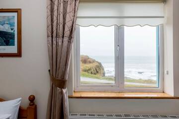 Фото номера Отдельный дом с 4 спальнями Дома для отпуска Portbeg Holiday Homes at Donegal Bay г. Бандоран 7