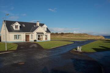 Фото номера Отдельный дом с 4 спальнями Дома для отпуска Portbeg Holiday Homes at Donegal Bay г. Бандоран 90